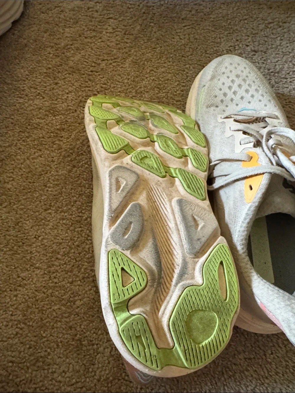Hoka one women’s  White Running Shoes with Yellow Accents Clifton 9